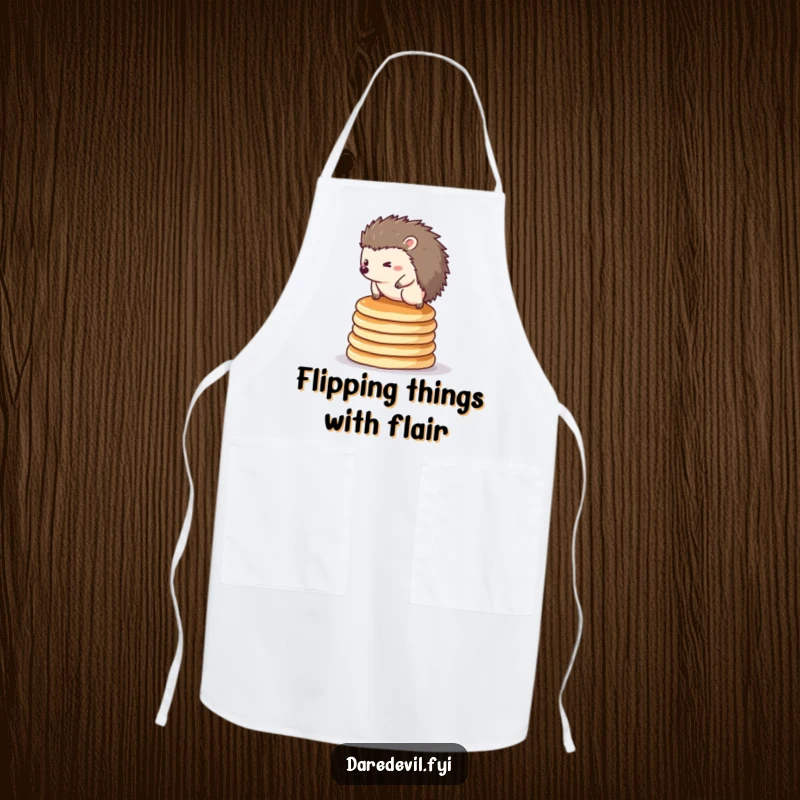 Funny hedgehog apron: a brave hedgehog balancing on a stack of pancakes, perfect for kitchen fun.