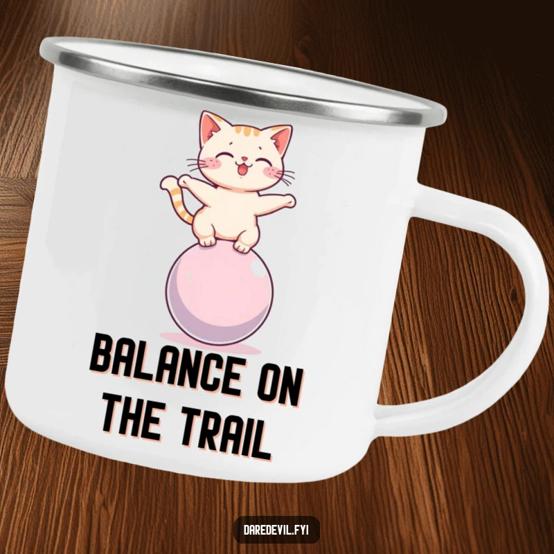 Funny cat balancing on a rolling sphere, printed on a durable camping mug for humorous outdoor enjoyment.