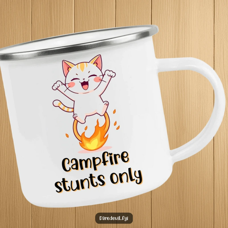 Funny camping mug showing a mischievous cat gleefully leaping over a fiery hoop, ideal for adventurous outdoor moments.