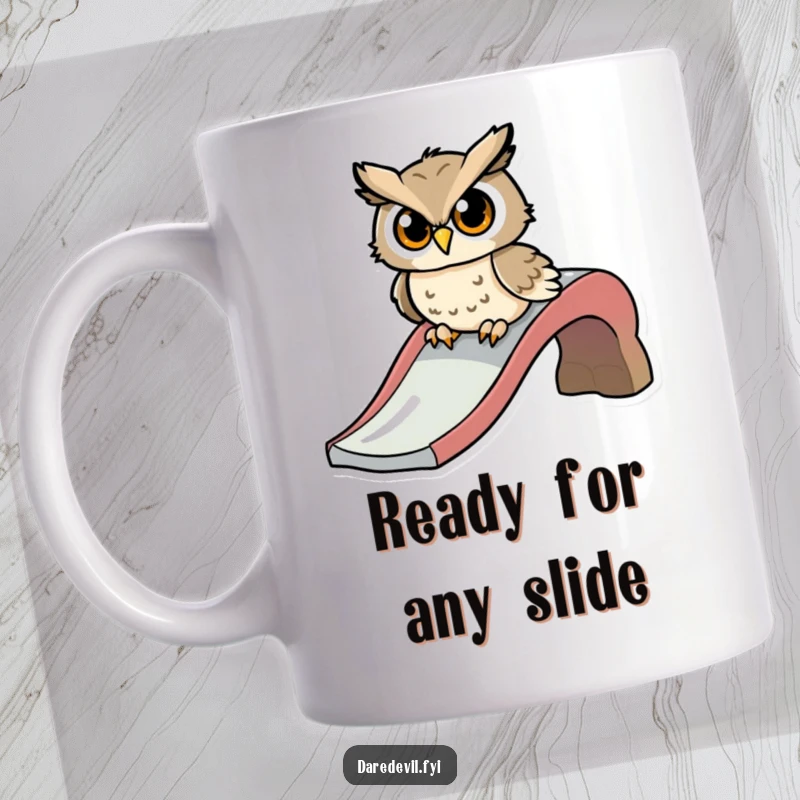 Funny mug showcasing a determined owl character poised at the top of a slide, ready to zoom down with excitement.