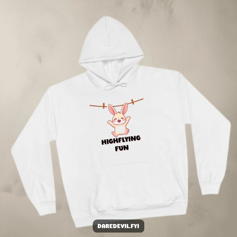 Funny rabbit swings wildly on a clothesline with a loud whoop, embodying wild joy on a funny hoodie.