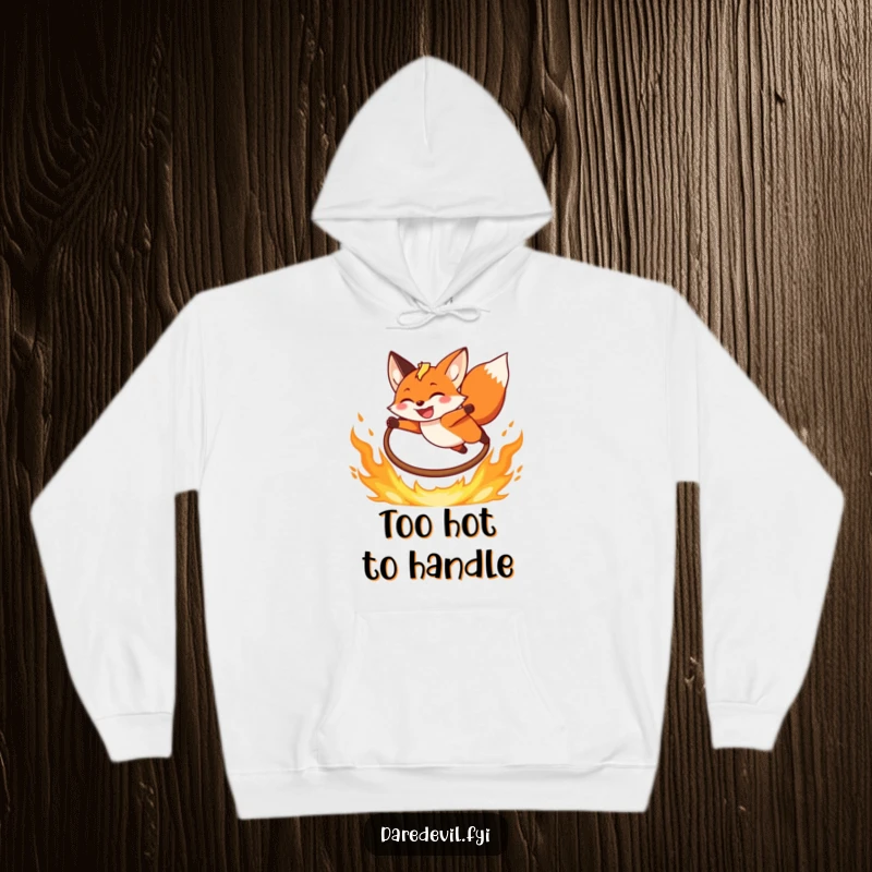 Funny Fox Hoodie featuring a grinning fox leaping over a fiery hoop, perfect for cozy nights and adventurous minds.