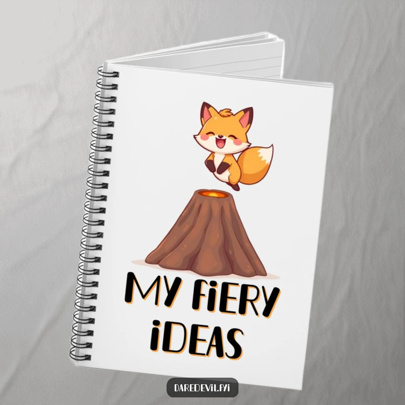 Funny fox notebook, featuring a fox leaping over a tiny volcano with a smile on its cover, for writing.