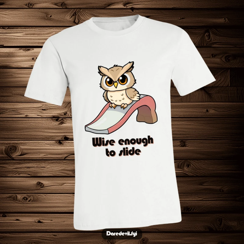 Funny t-shirt graphic of a determined owl character preparing to slide down a playground slide with speed and enthusiasm.