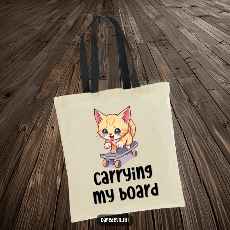 Funny tote bag featuring a playful kitten aggressively skateboarding down a slide, perfect for carrying essentials with style.