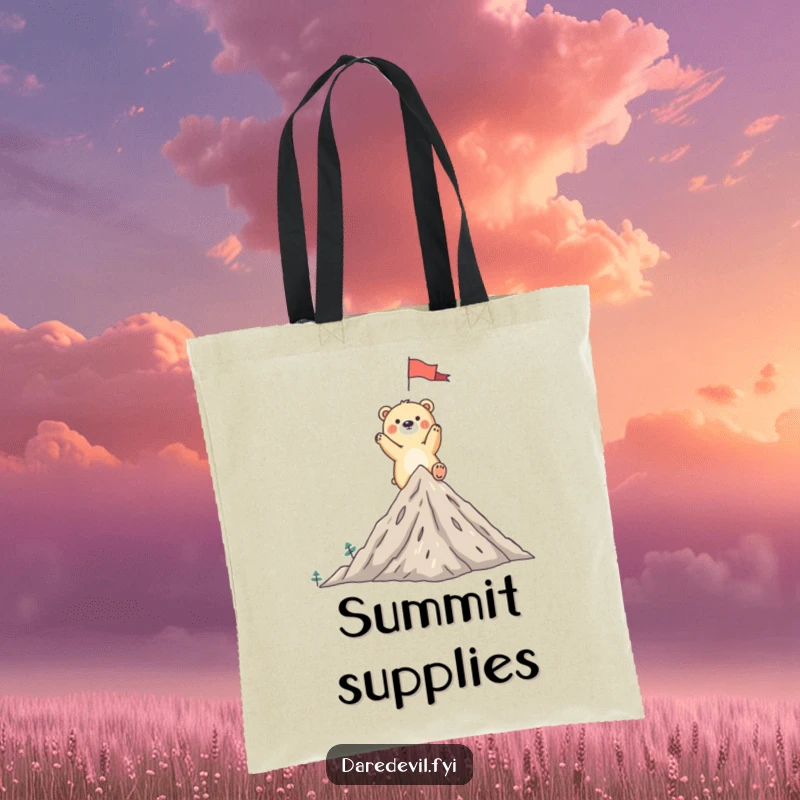 Funny bear tote bag featuring a whimsical bear triumphantly planting a flag on a tiny mountain peak, symbolizing victory.