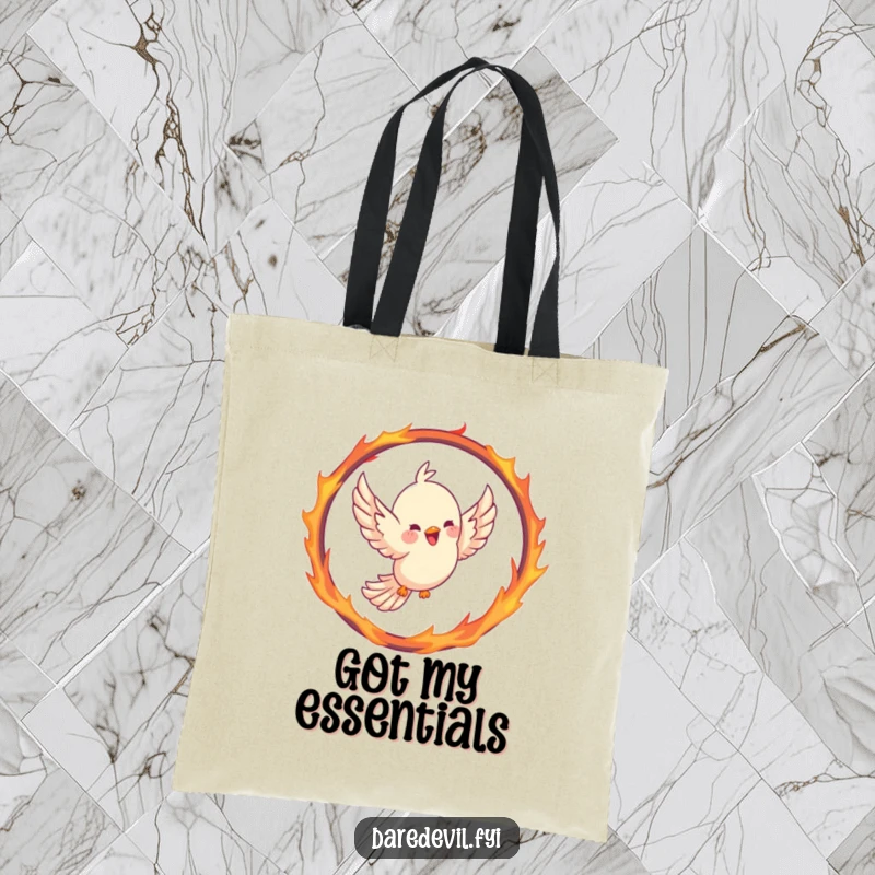 Funny bird tote bag featuring a joyful bird soaring through a hoop shaped like a fiery ring, symbolizing bravery and flight.